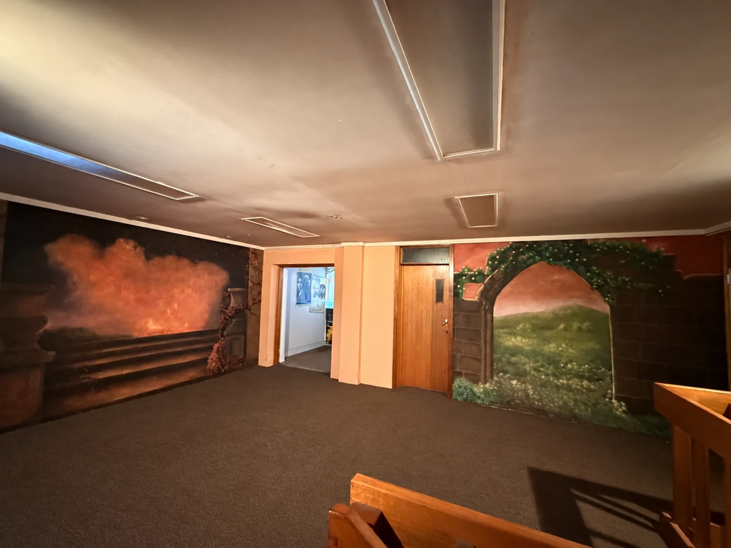 The two indoor murals, with tools and loose floor items digitally removed