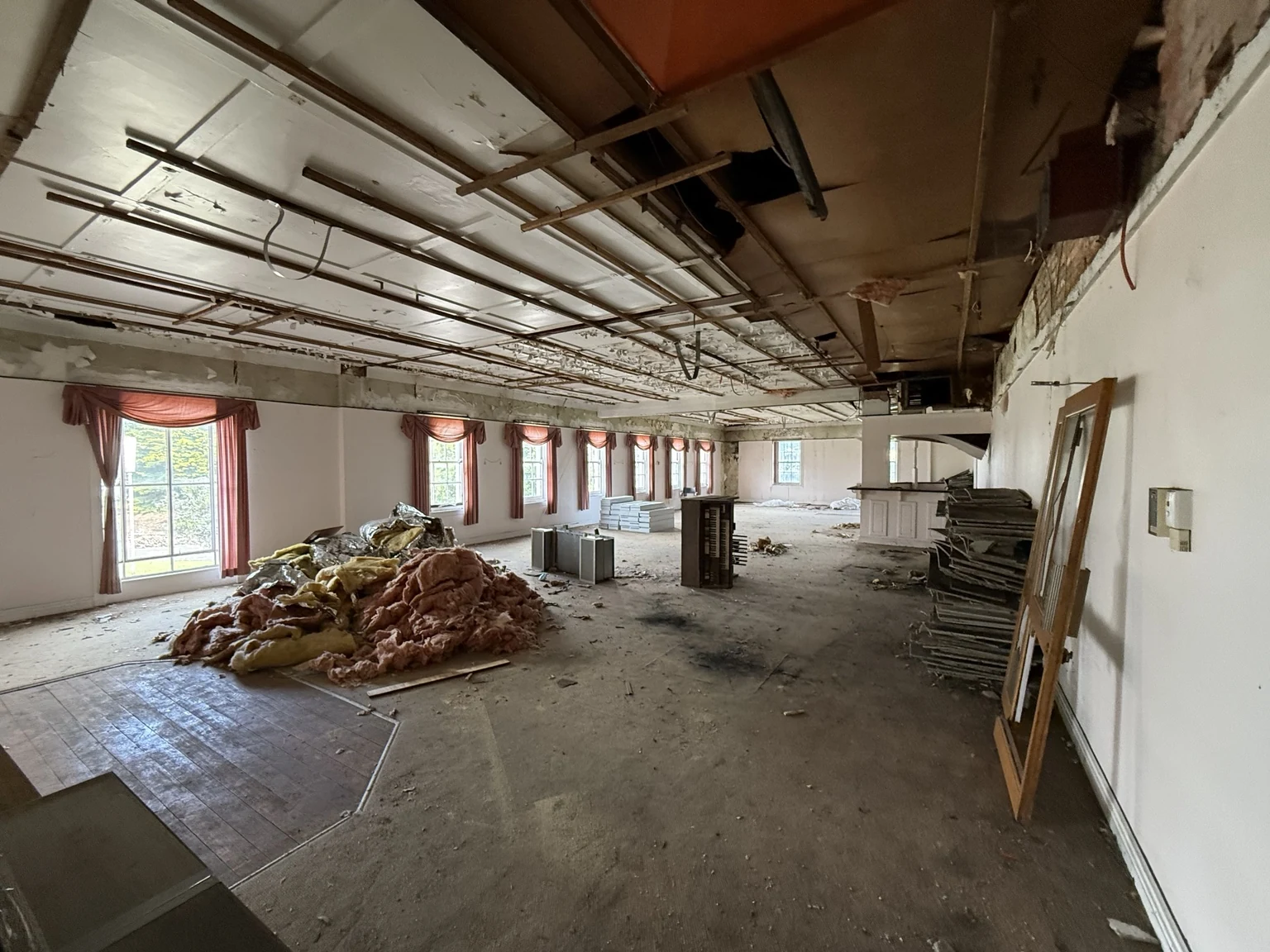 Supplied photograph of the former reception room and surviving white bar