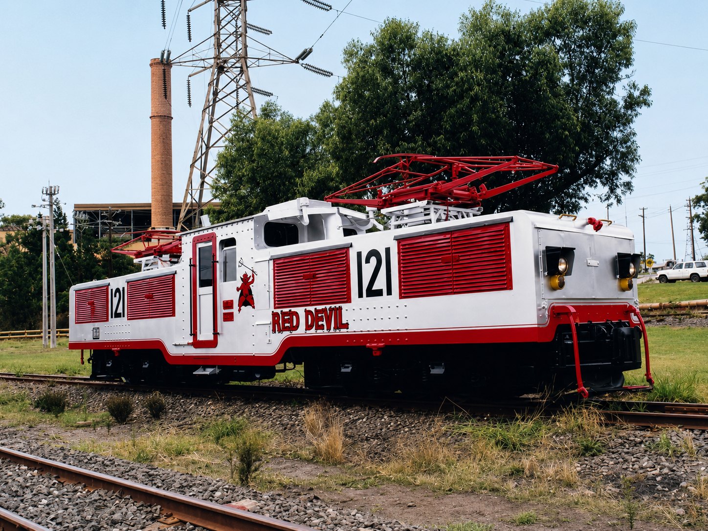 Restored historical photograph of Yallourn electric locomotive No. 121, Red Devil, with red shutters and pantographs.