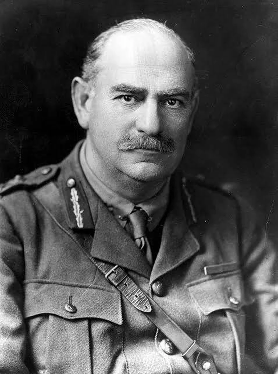 Black-and-white head-and-shoulders portrait of Lieutenant General Sir John Monash in military uniform.