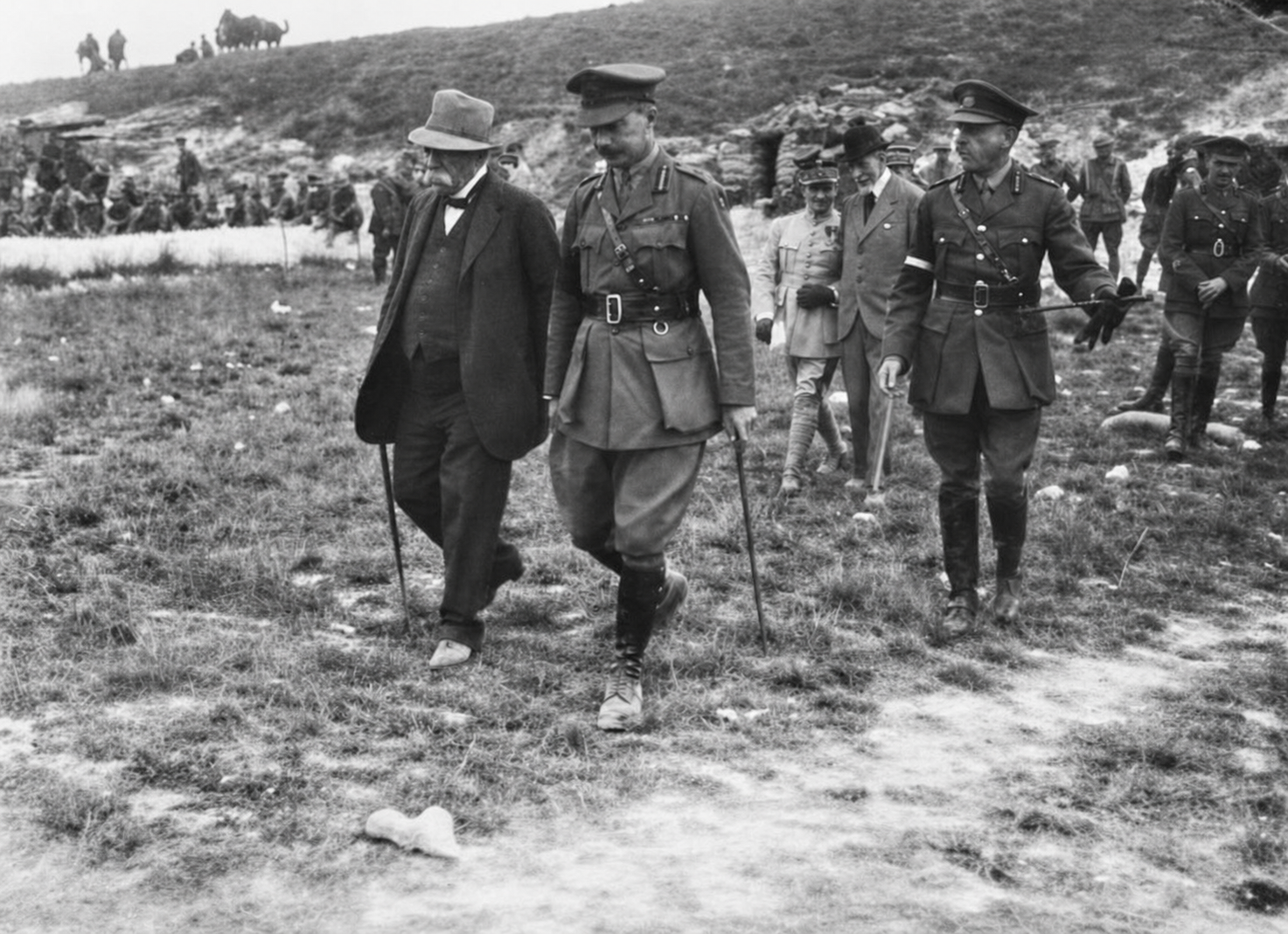 Georges Clemenceau walks beside Major General Ewen Sinclair-MacLagan, with Lieutenant General John Monash at right.