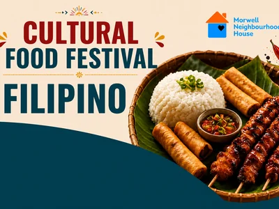 A vibrant spread of multicultural dishes including Filipino skewers, Sudanese stew, Rohingya rice and Italian pasta on a decorated table.