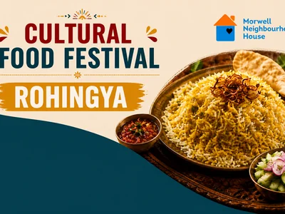 A vibrant spread of multicultural dishes including Filipino skewers, Sudanese stew, Rohingya rice and Italian pasta on a decorated table.