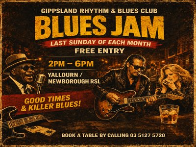 A blues musician playing electric guitar on a small stage at a pub jam session, with amplifiers and a warm, dimly lit atmosphere behind them.