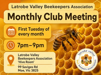 A group of beekeepers gathered around a table in a community room, discussing beekeeping equipment and hive management.
