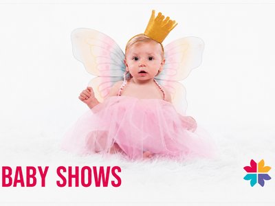 Colourful event poster showing a baby in a fairy costume, winter orchids, and a nursery rhyme performer at Mid Valley Shopping Centre.