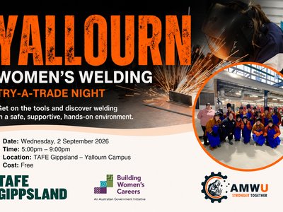 A woman in welding protective gear creating sparks at a workbench inside a TAFE workshop.