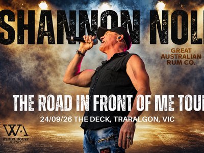 Shannon Noll performing live on stage holding a microphone, promotional poster for The Road In Front Of Me Tour at The Deck Traralgon.