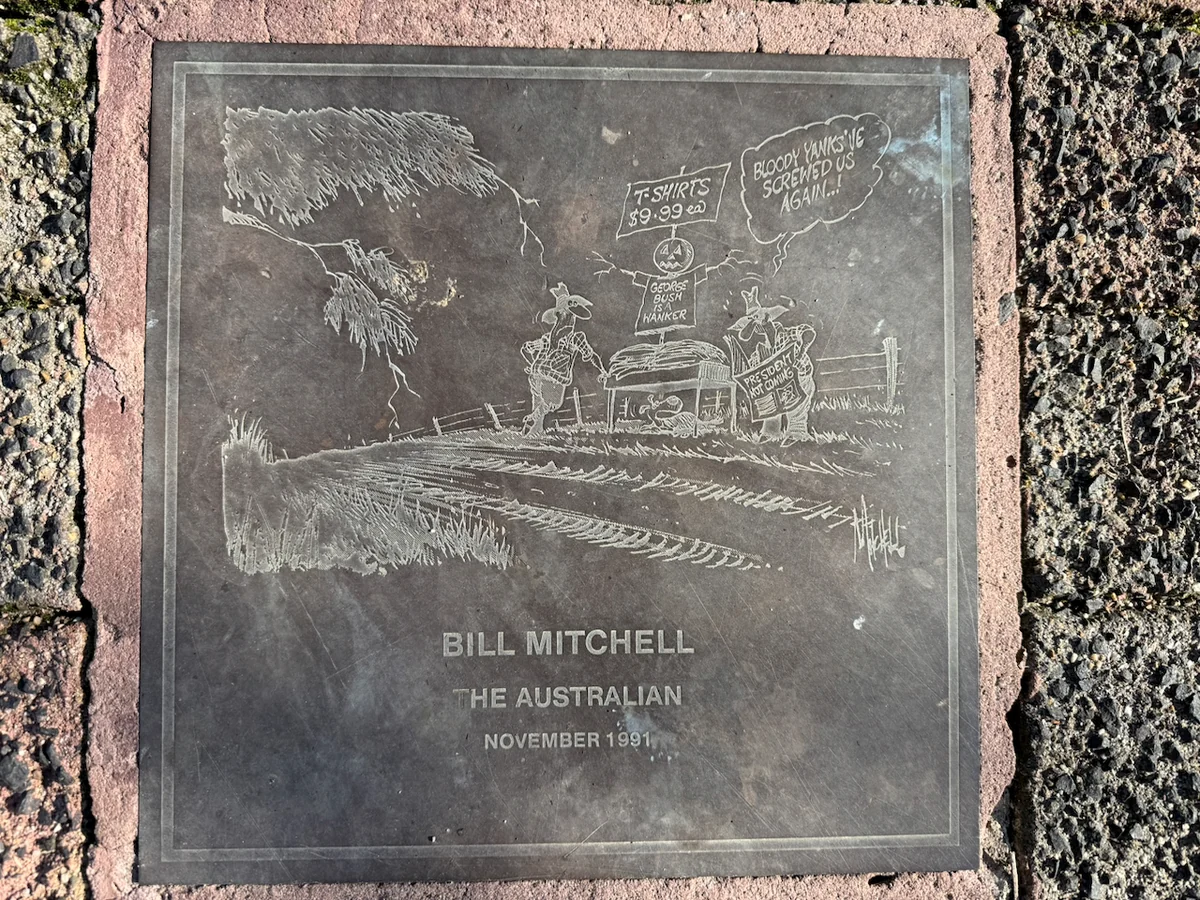 Original photograph of Bill Mitchell’s engraved November 1991 cartoon plaque in the Moe footpath.