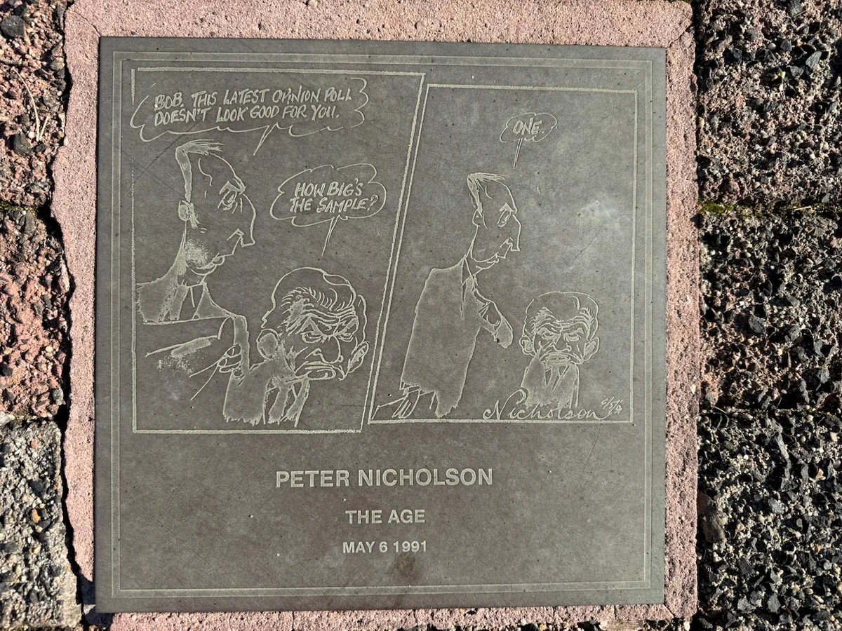 Original photograph of Peter Nicholson’s engraved 6 May 1991 cartoon plaque in the Moe footpath.