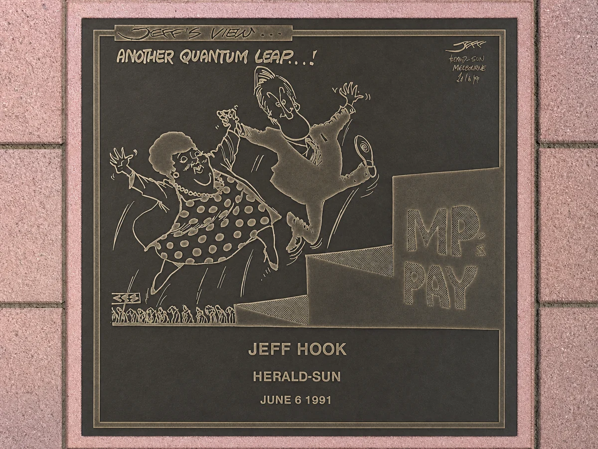 AI-assisted restoration concept of Jeff Hook’s 6 June 1991 Herald-Sun plaque with the hidden fishhook retained.