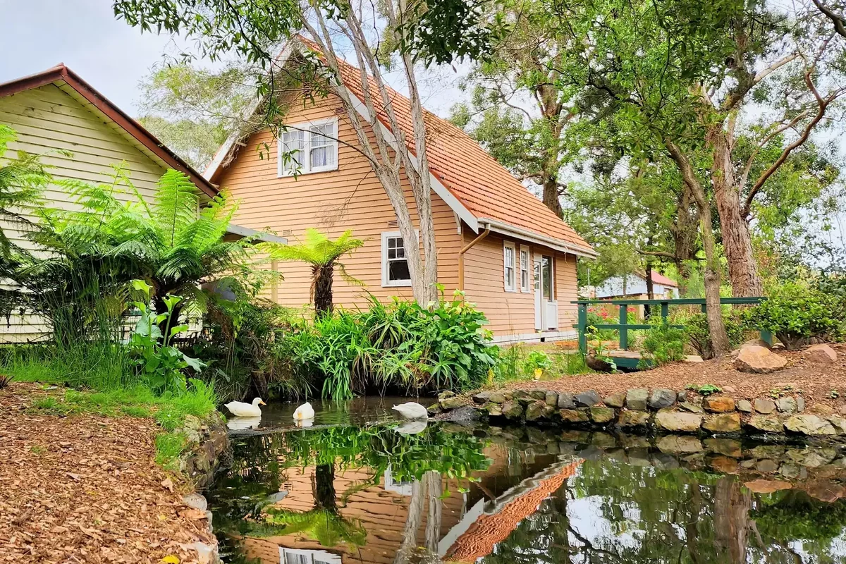 A weatherboard house from Yallourn stands within Old Gippstown Heritage Park.