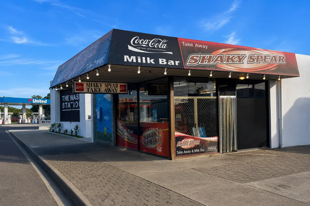 The Shaky Spear Milk Bar shopfront on Shakespeare Street in daylight.