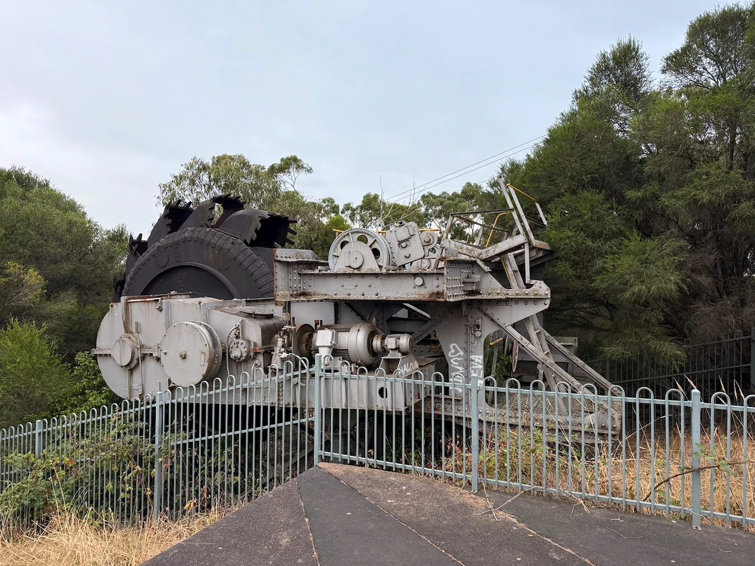 Preserved mining machinery displayed outdoors at PowerWorks.