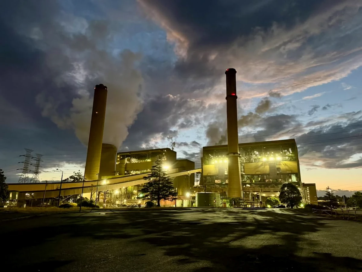 Yallourn Power Station operating beneath a dramatic evening sky.