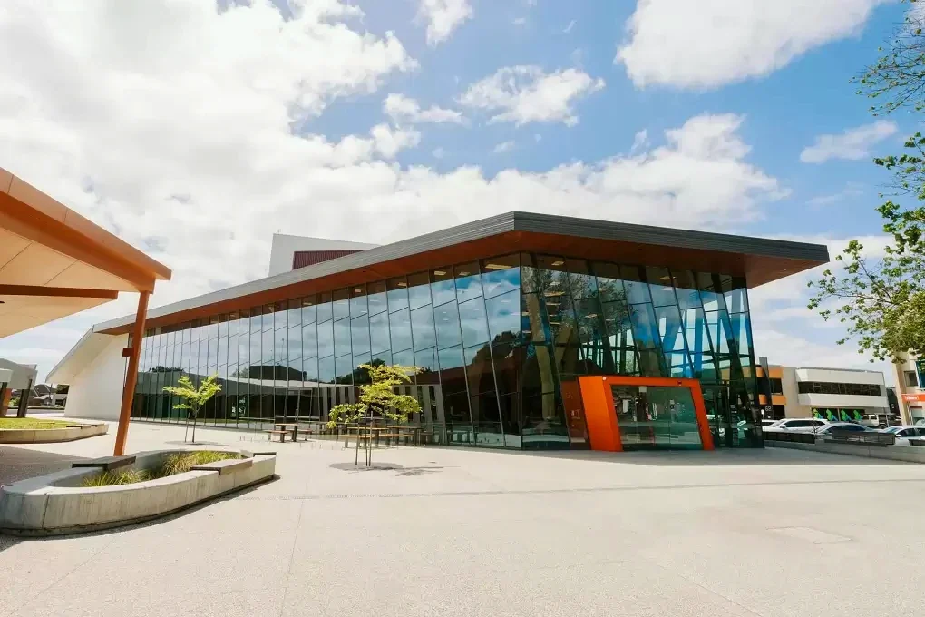 The glass-fronted Gippsland Performing Arts Centre opens onto a paved civic forecourt.