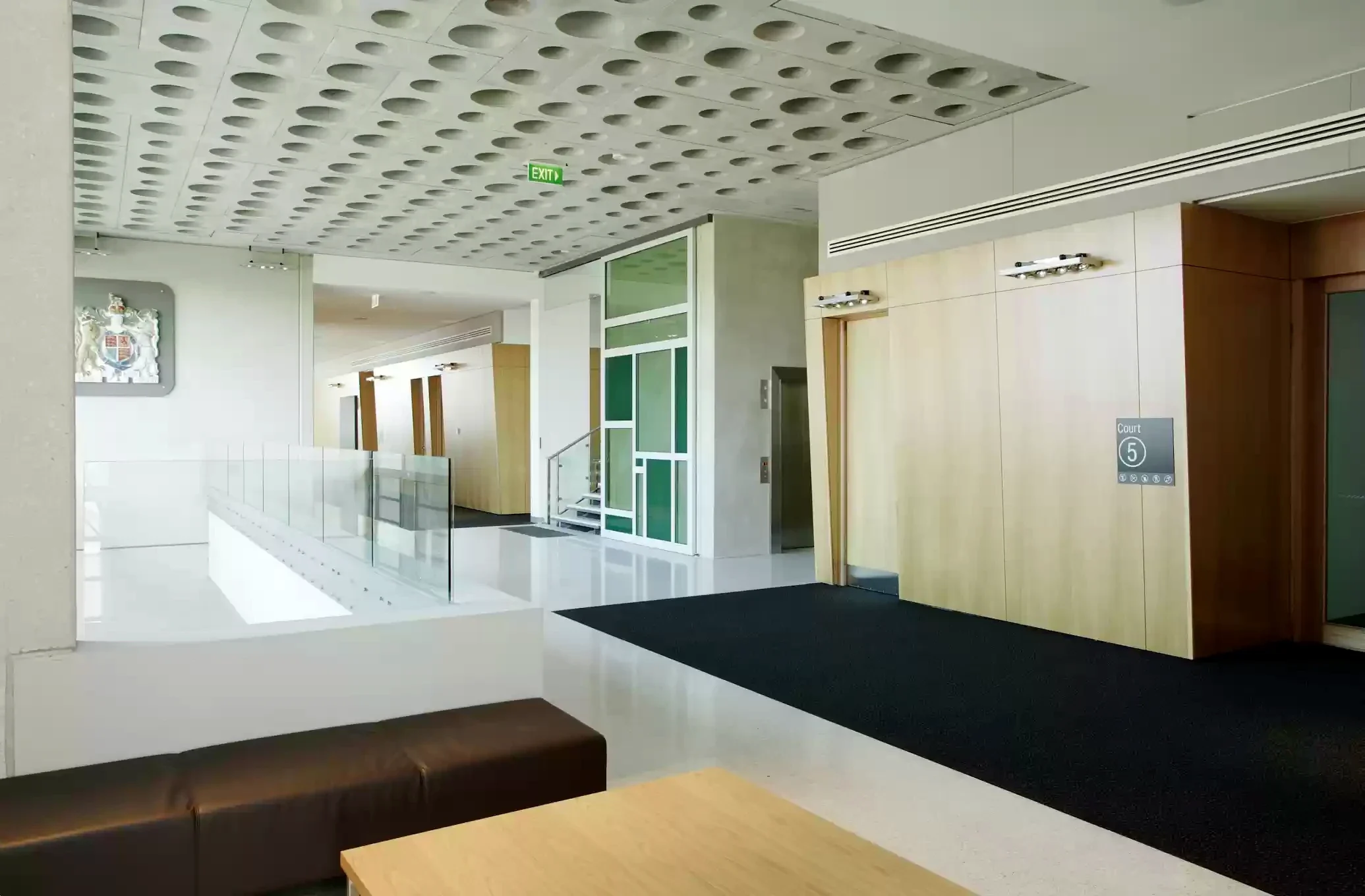 An empty upper-level circulation area outside Court 5 at the Latrobe Valley Law Courts.