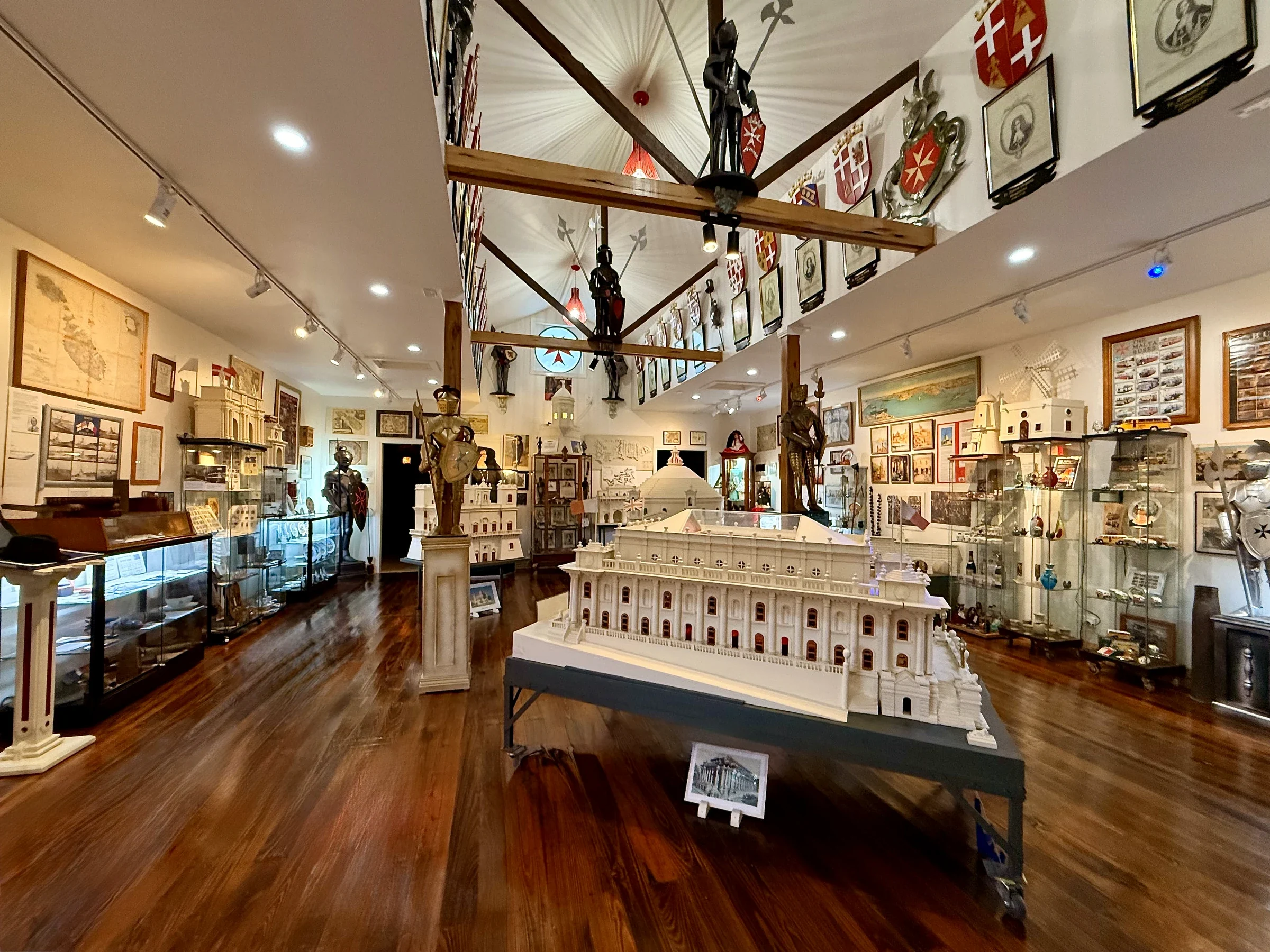 Handcrafted architectural models, armour and display cases fill the Maltese Museum's main gallery.