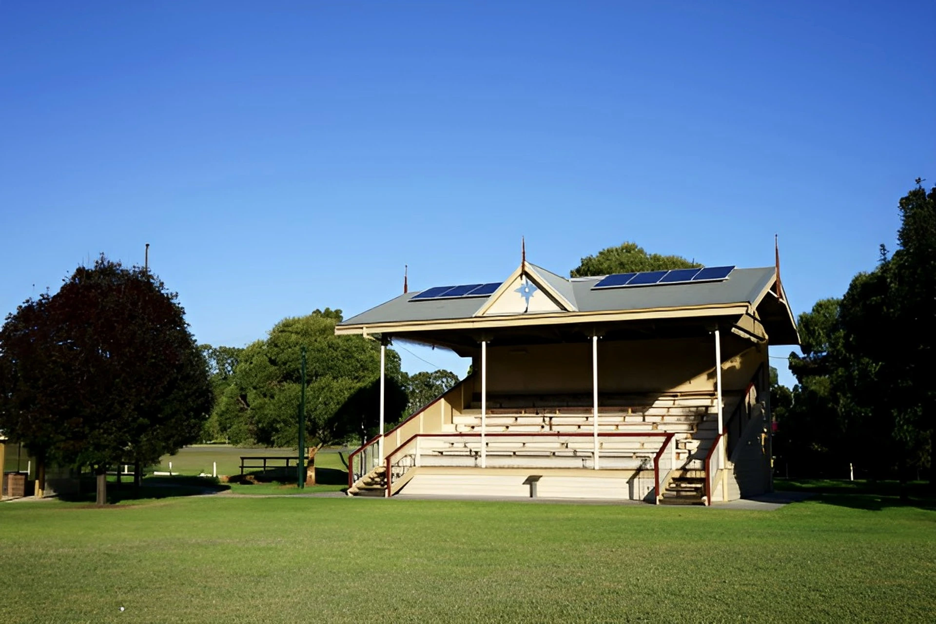 The historic grandstand overlooking the green recreation reserve at Toongabbie